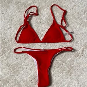 BRAND NEW red bikini Adjustable straps.